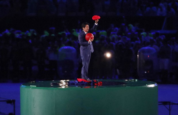 Japan's then Prime Minister Shinzo Abe appeared under a Super Mario costume at the Tokyo Olympics spectacular presentation at the closing of the Rio 2016 Olympics