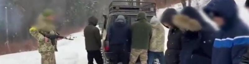 Ukrainian deserters arrested by the army as they try to cross the icy Carpathian Mountains to flee the country.