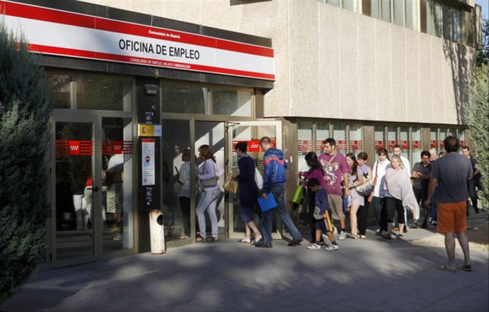 Queue of young workers at an employment office