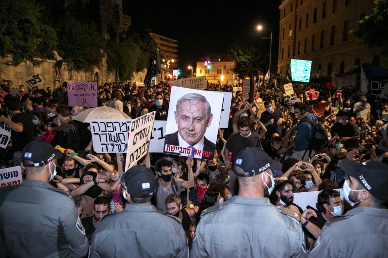 Israelis protest against Israeli prime minister Benjamin Netanyahu outside Prime Minister official residence in Jerusalem on July 25
