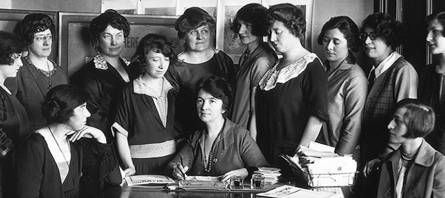 Margaret Sanger surrounded by co-religionists