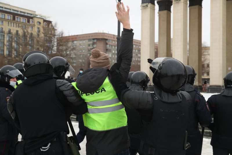 Police in Novosibirsk arrest a journalist at an anti-war demonstration this morning.
