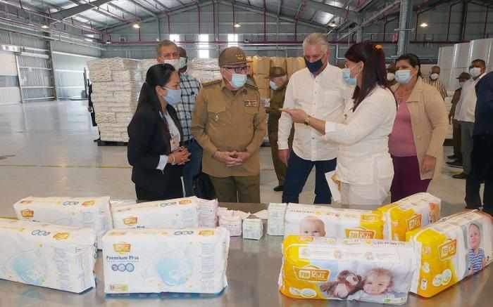 Raul Castro and Diaz Canel visit a Vietnamese-owned diaper factory in the Mariel "special economic zone". Underlying the protests in Cuba lies the economic collapse of the regime and resistance to its only strategy: increasing exploitation and selling ever cheaper labor to international capital.