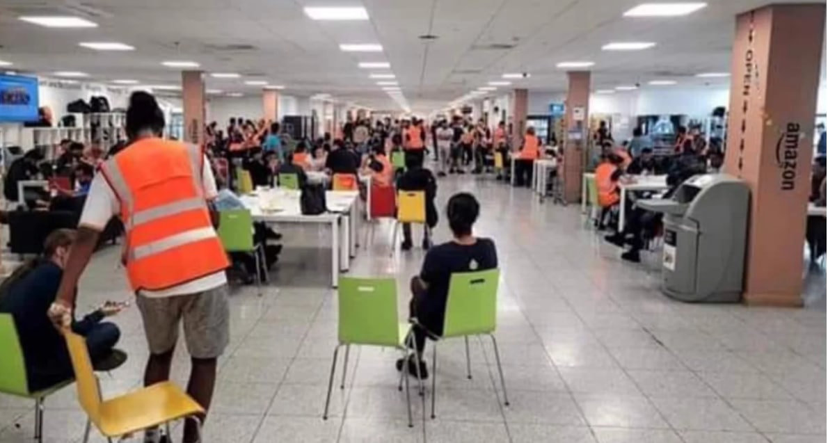 Striking workers gather in the canteen at Amazon Coventry