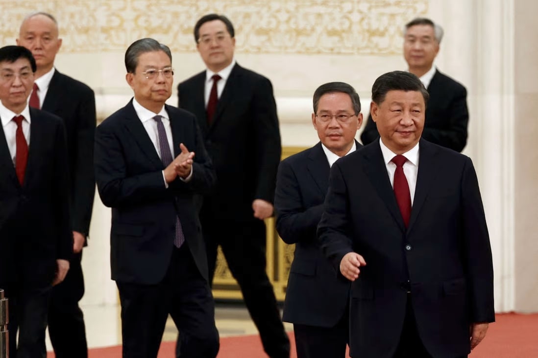 Xi surrounded by new Politburo members